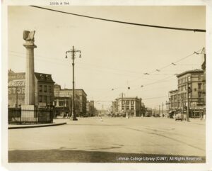 Image of Bronx County Trust Building, Bronx World War Memorial, and Estey Piano Company clock tower