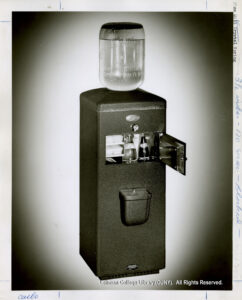 Image of a water-cooler with a slot for ice cubes, Pepsi and tonic water