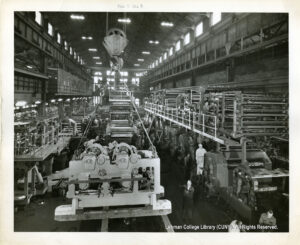 Image of workers and printing presses.