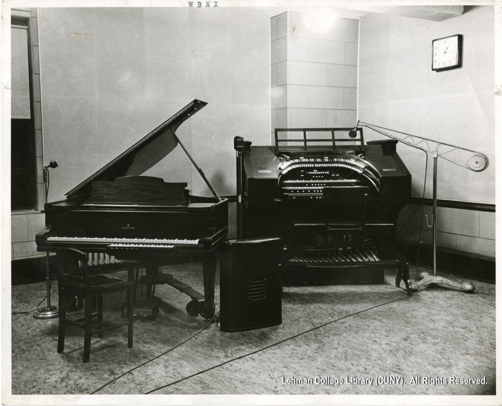 Image of a piano and an organ. Each have microphones and wires leading up to them.