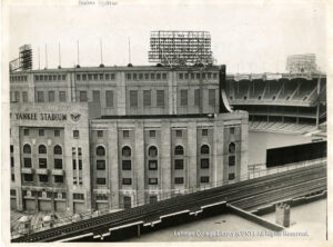 View of Yankee Stadium from the IRT elevated #4 subway line. Banners note the Yankee's being American League Champions for 1941 and 1942; and World Champions in 1943.