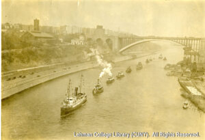 Image of several steam ships sailing down the Harlem River under High Bridge.